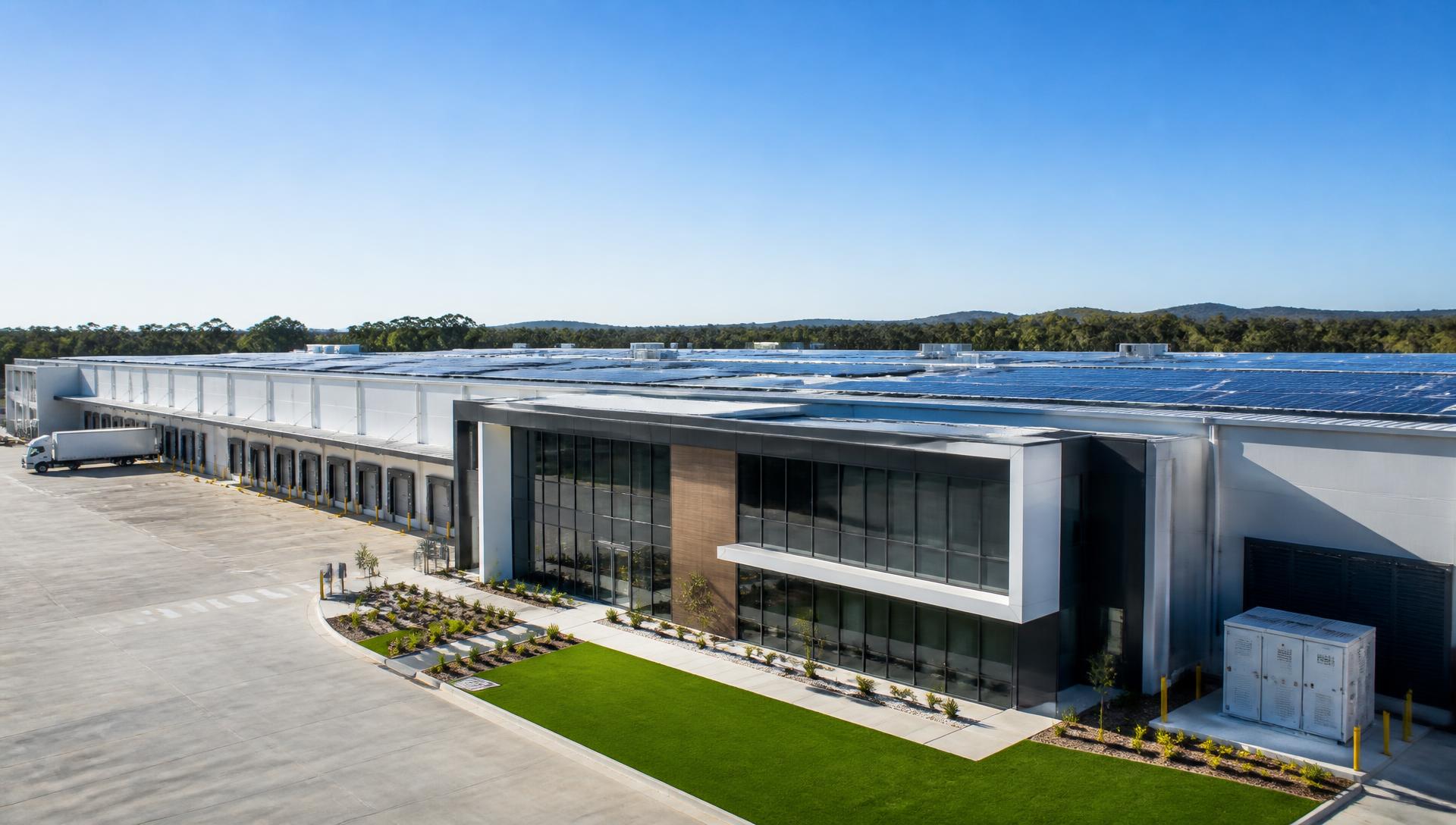 Premium Australian commercial facility with an extensive rooftop solar installation in daylight