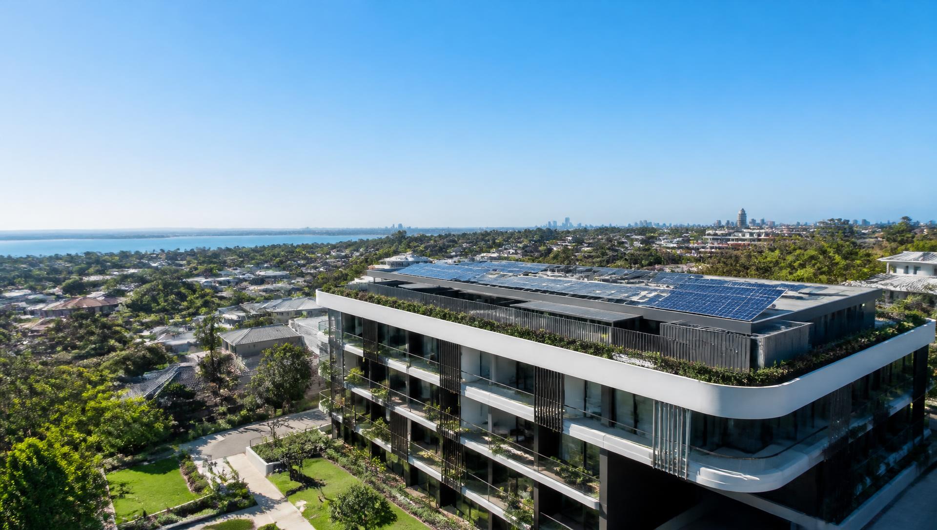 Premium Australian apartment building with rooftop solar in clear daylight